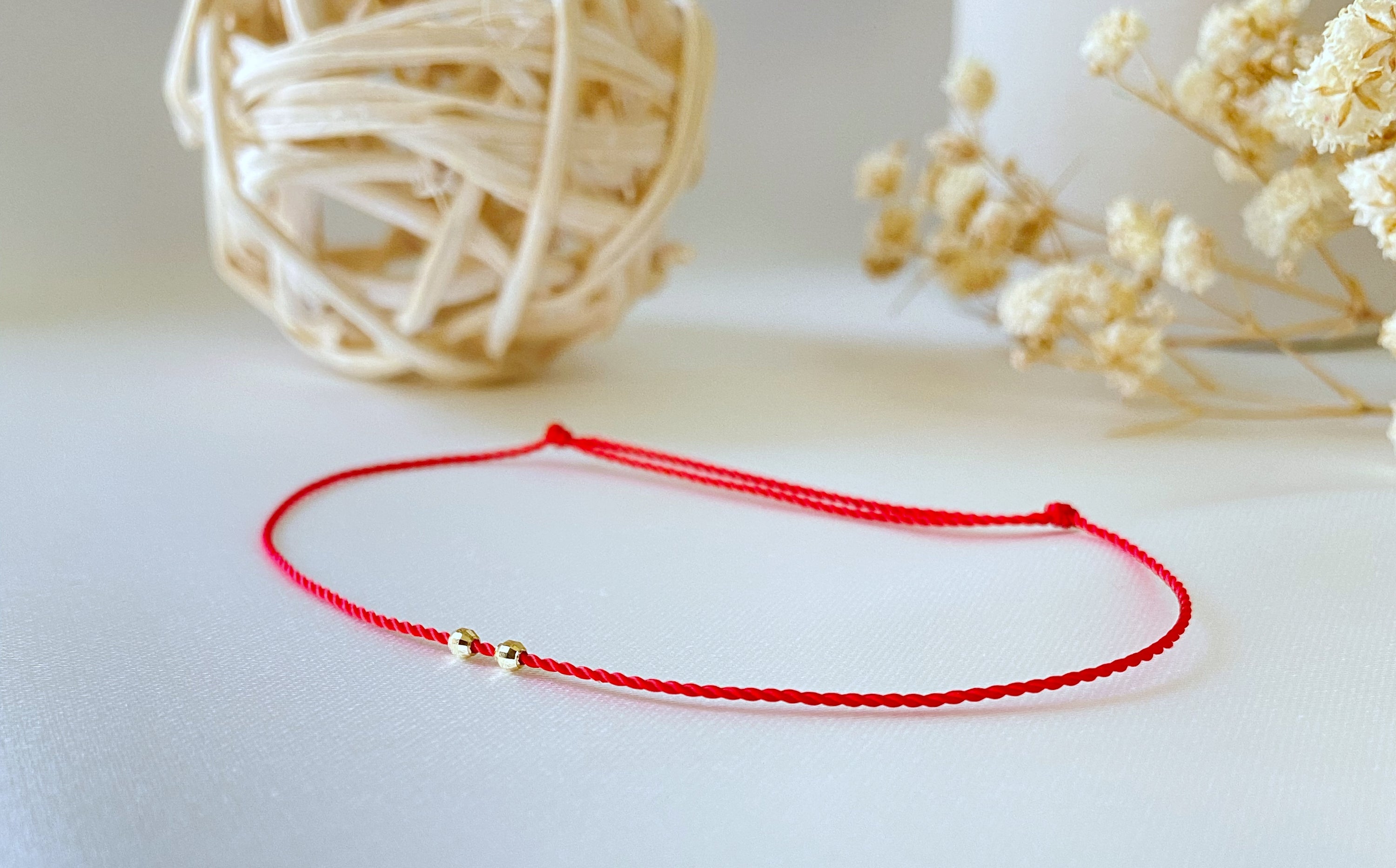 PULSERA DE DOS CUENTAS DE ORO DE 14K CON CORTE DIAMANTE