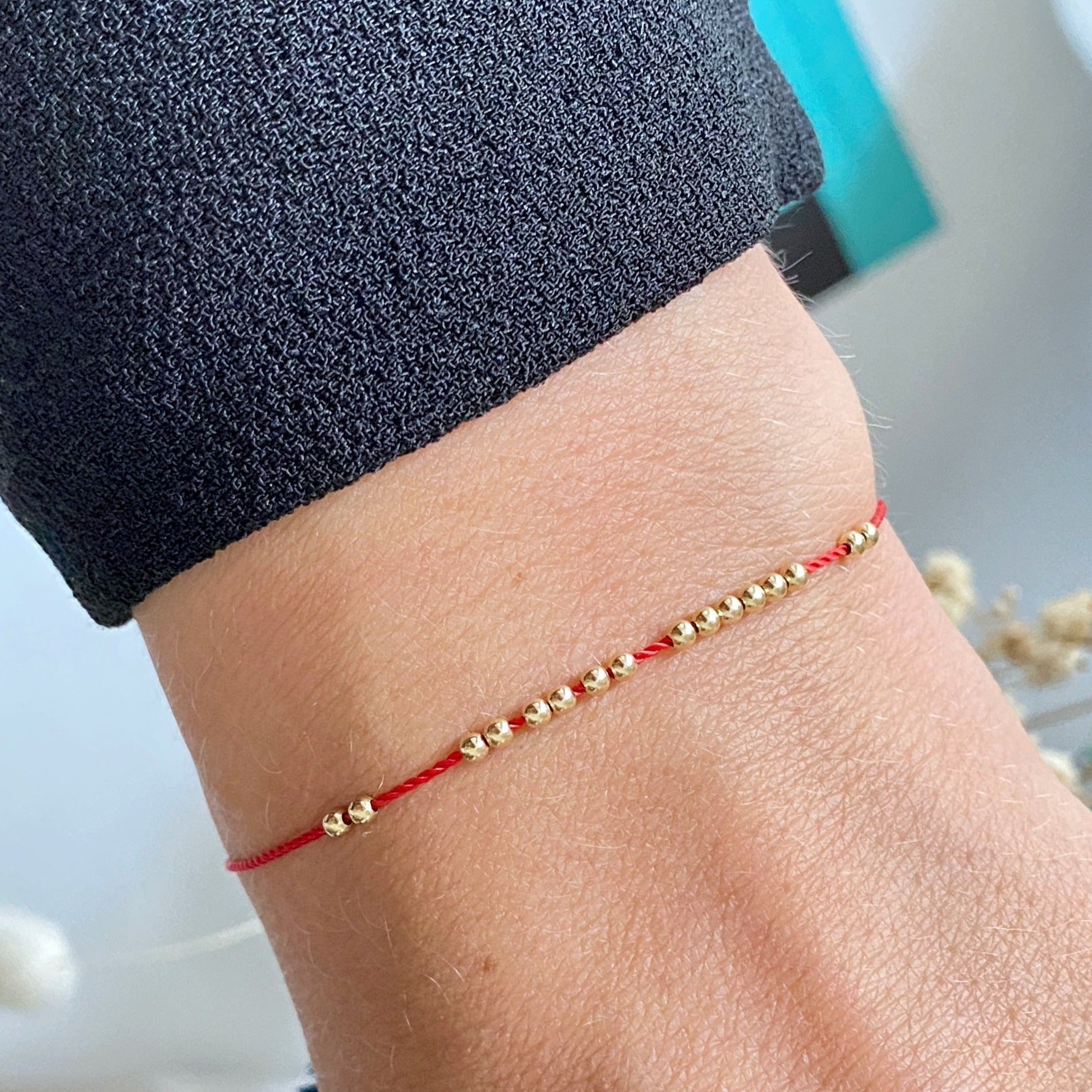 red bracelet - gold jewellery - kabbalah