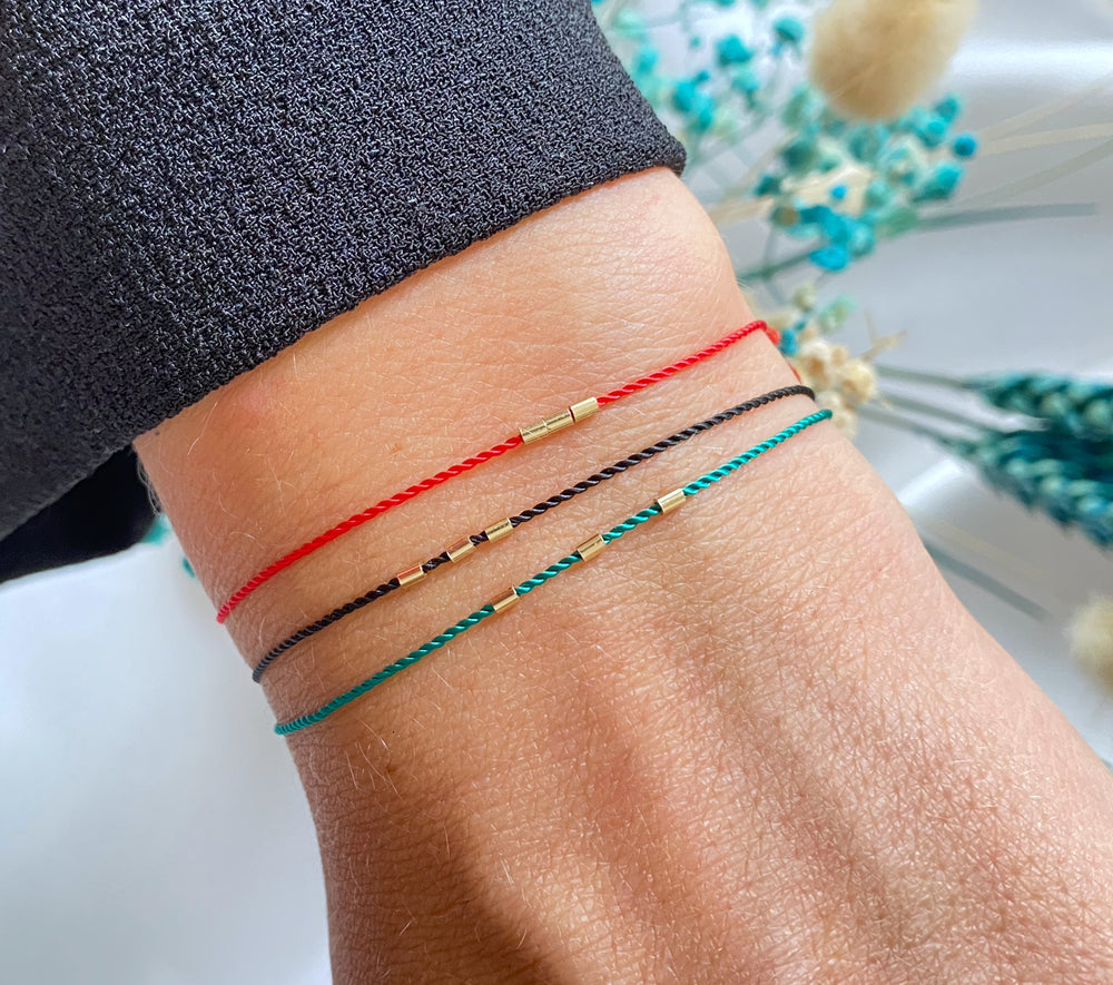 Armband mit drei Goldröhren