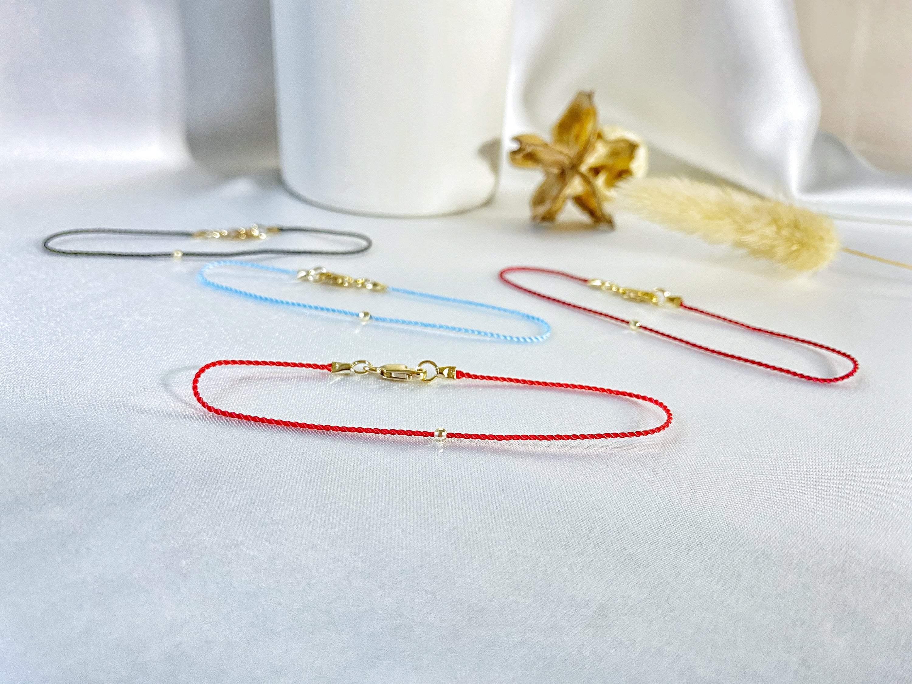 Lobster clasp and 14k gold bead bracelet