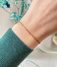 red bracelet - kabbalah thread