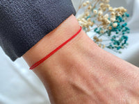 red bracelet